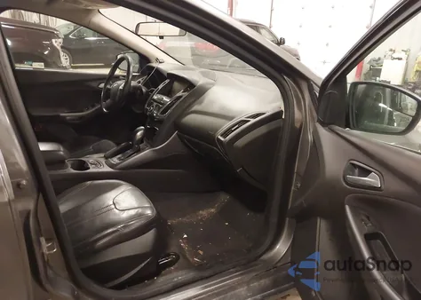 2014 Ford Focus Titanium from USA, damaged, VIN 1FADP3J27EL289596